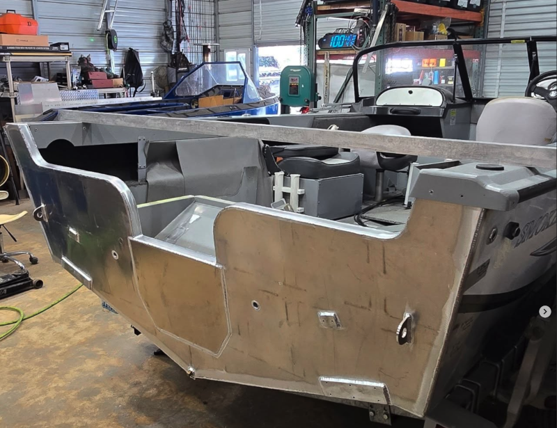 Raw aluminum jet boat interior and side panels being fabricated in the Vaughn Bay shop