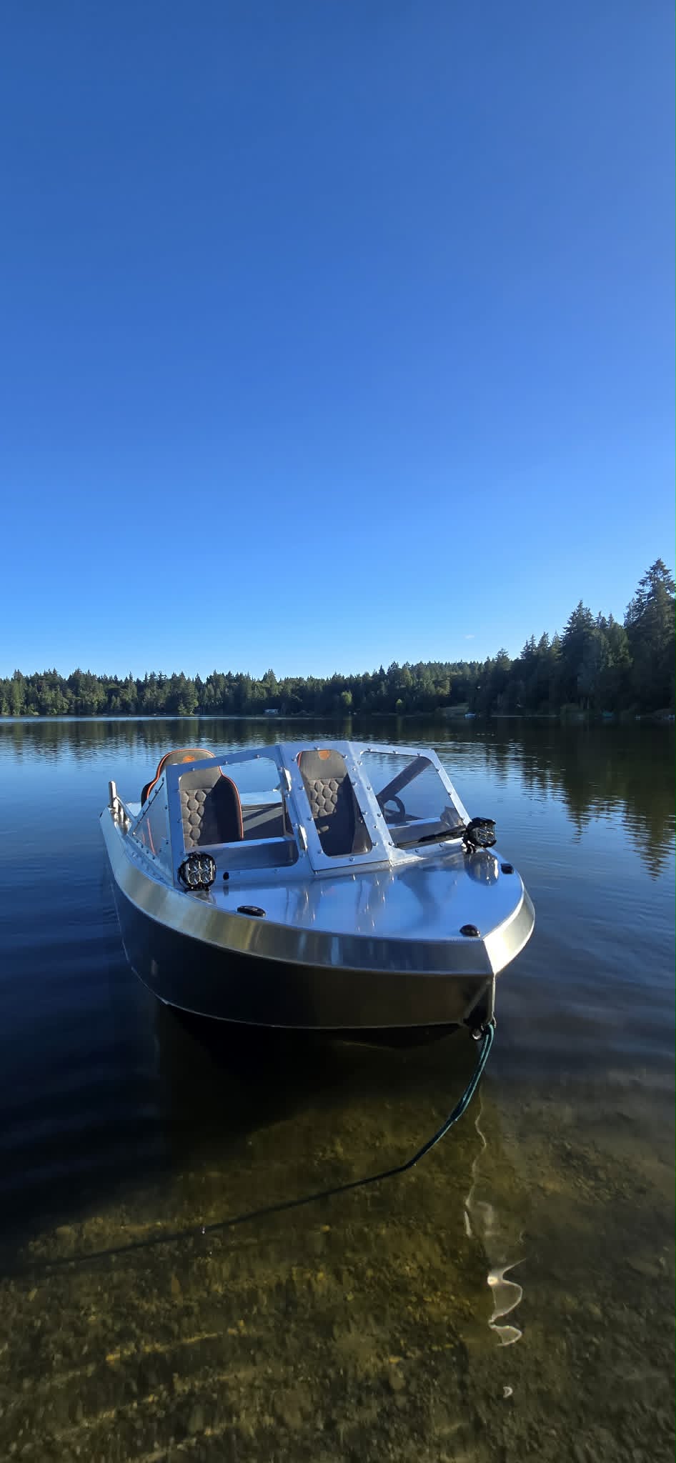 Head-on view of the VB14 floating in clear shallow water