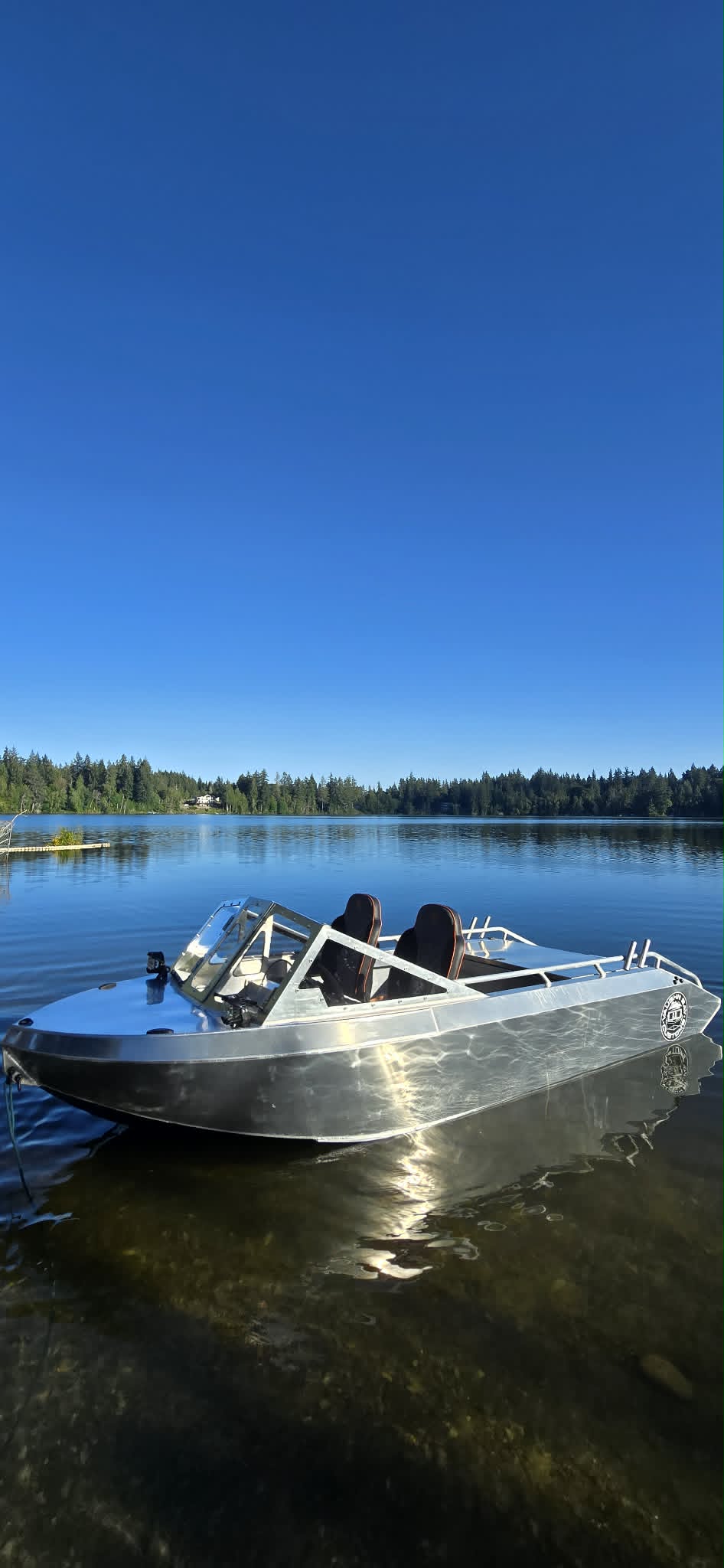 Port profile of the VB14 on the lake reflecting the sun